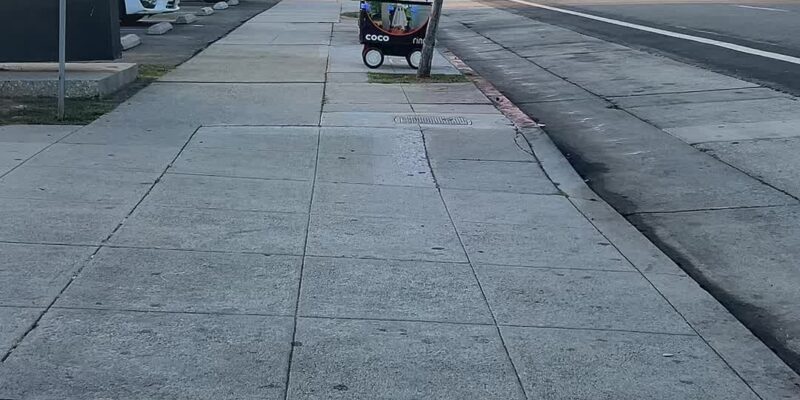 The Lonely Cart on the Sidewalk